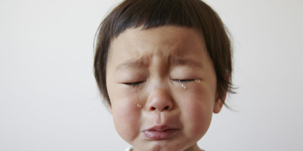 Children in tears cry.